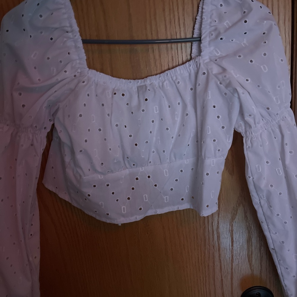 White eyelet long sleeve blouse with front detail